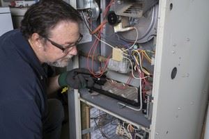 Technician working on an HVAC