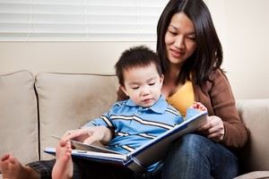 Mother and child reading a book