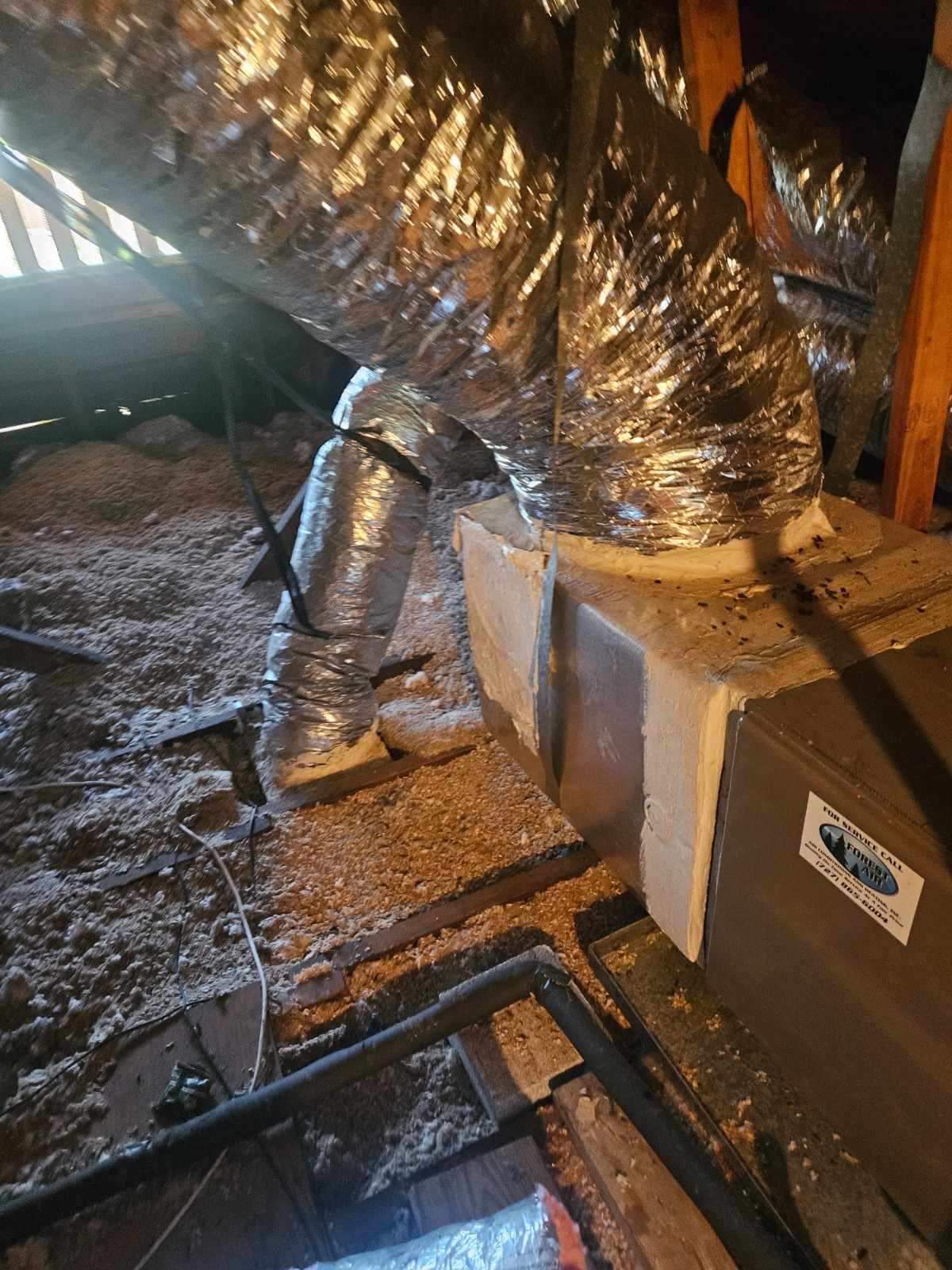 Insulated flex ductwork in an attic ready for air duct cleaning