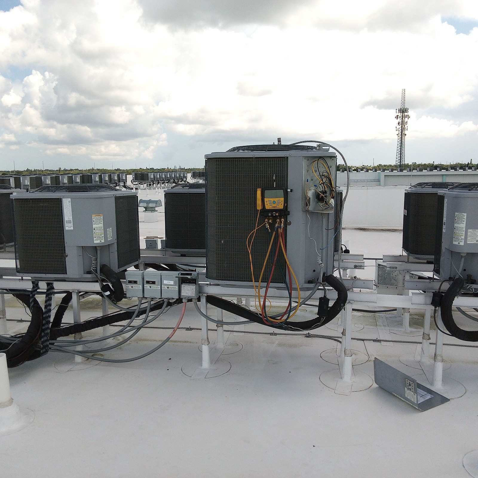 Commercial rooftop HVAC units on a business roof in Pinellas County, FL