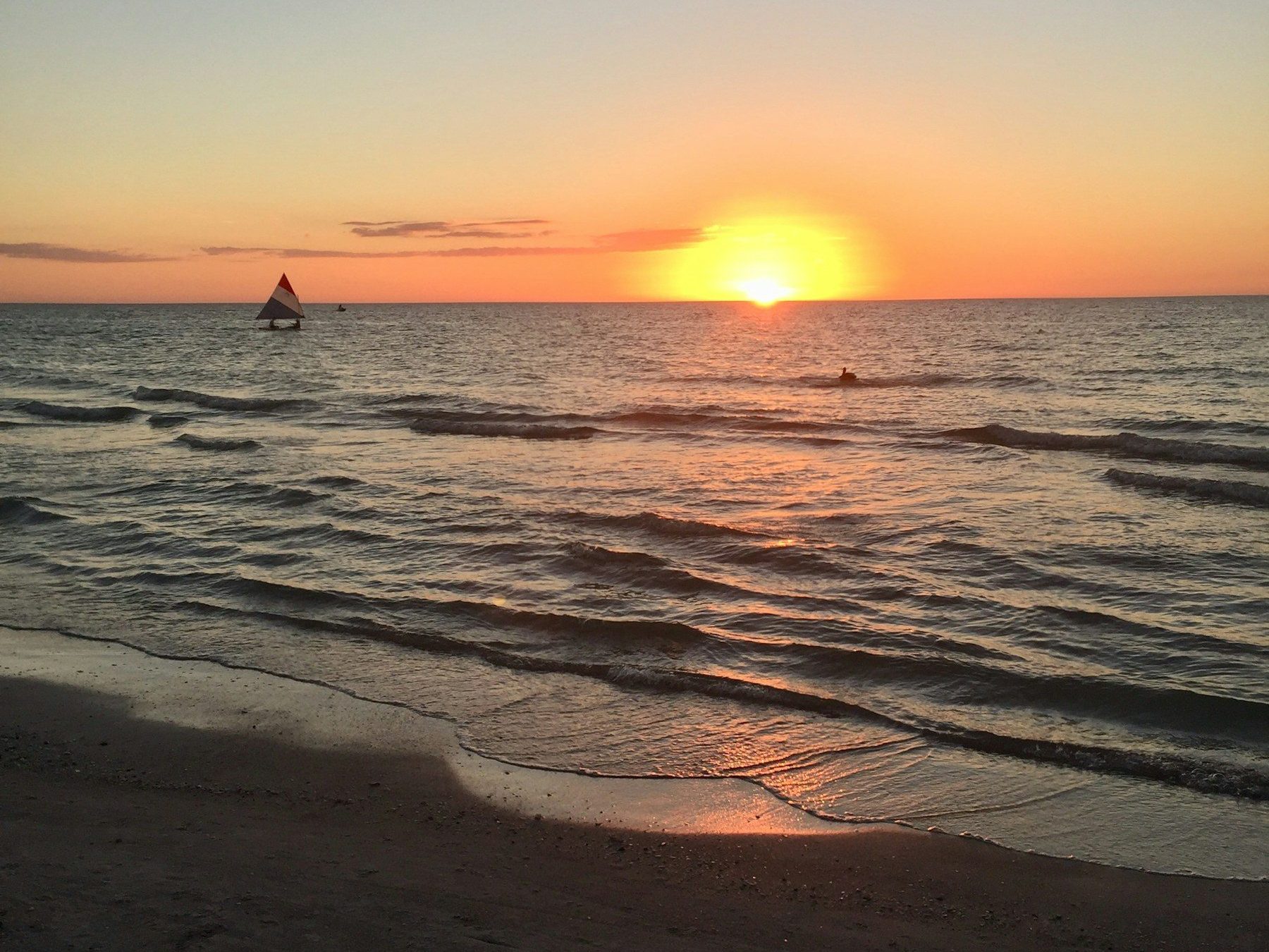 Sailboat on the Gulf of Mexico at sunrise off Indian Shores, FL