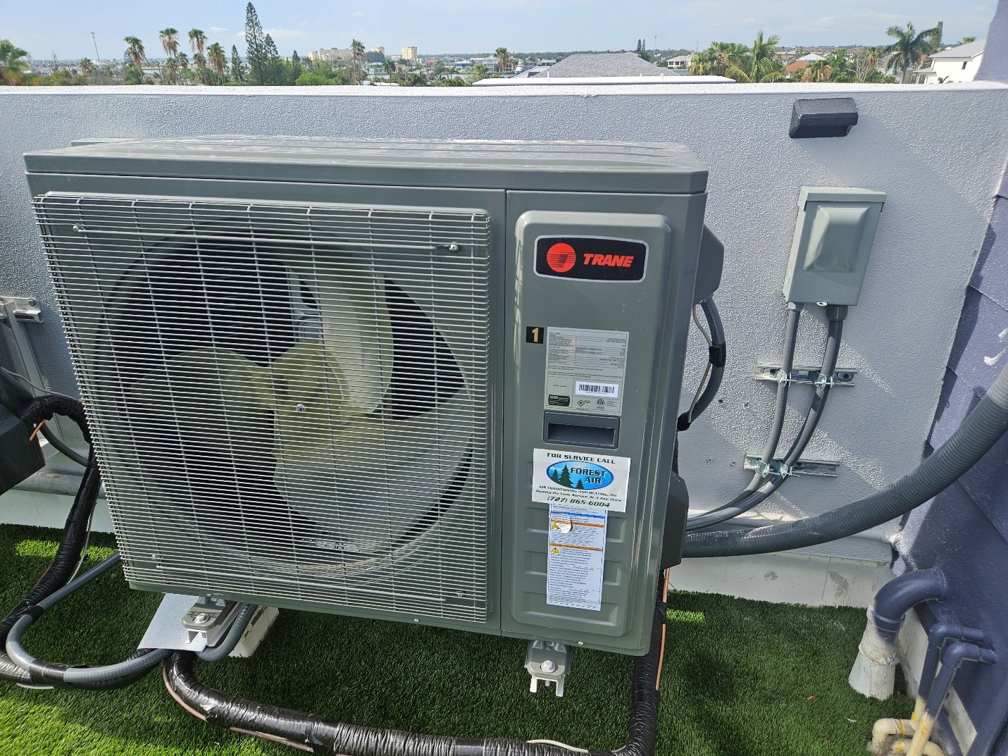Trane outdoor HVAC unit installed beside a home in Pinellas County, FL