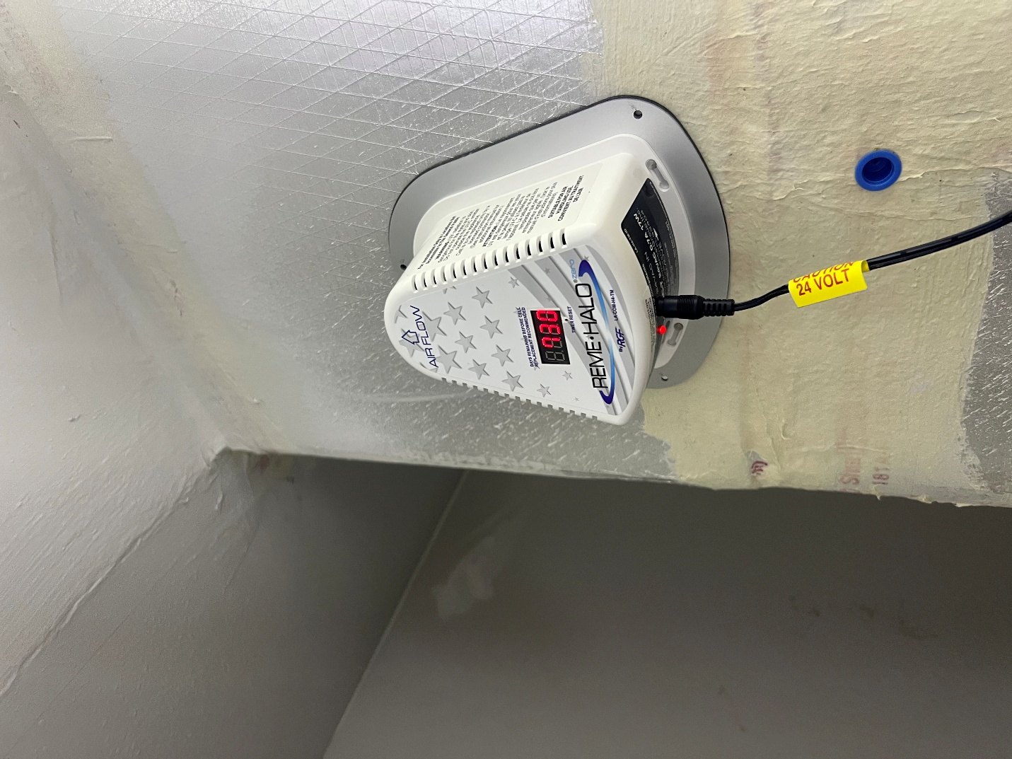 Whole-home air purifier installed on the ductwork of a home HVAC system in Tampa, FL